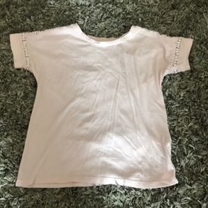 Light pink cut outs on the shoulders